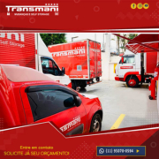 veículos vermelhos e caminhões da Transmani